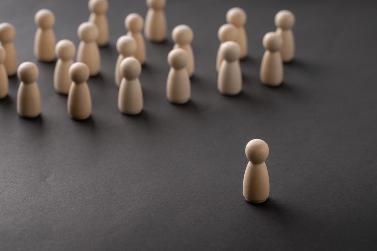 Wooden pegs representing people